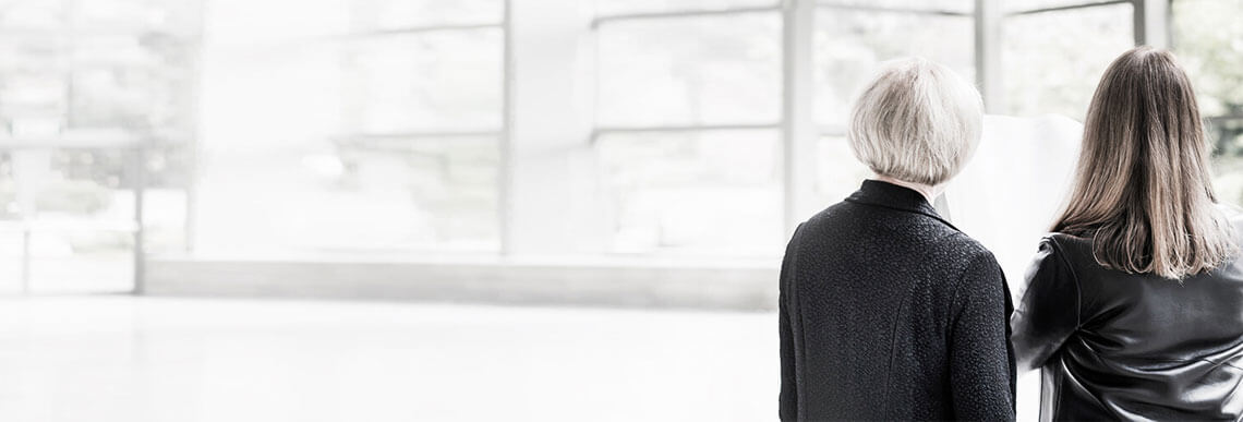 Two People in bright room